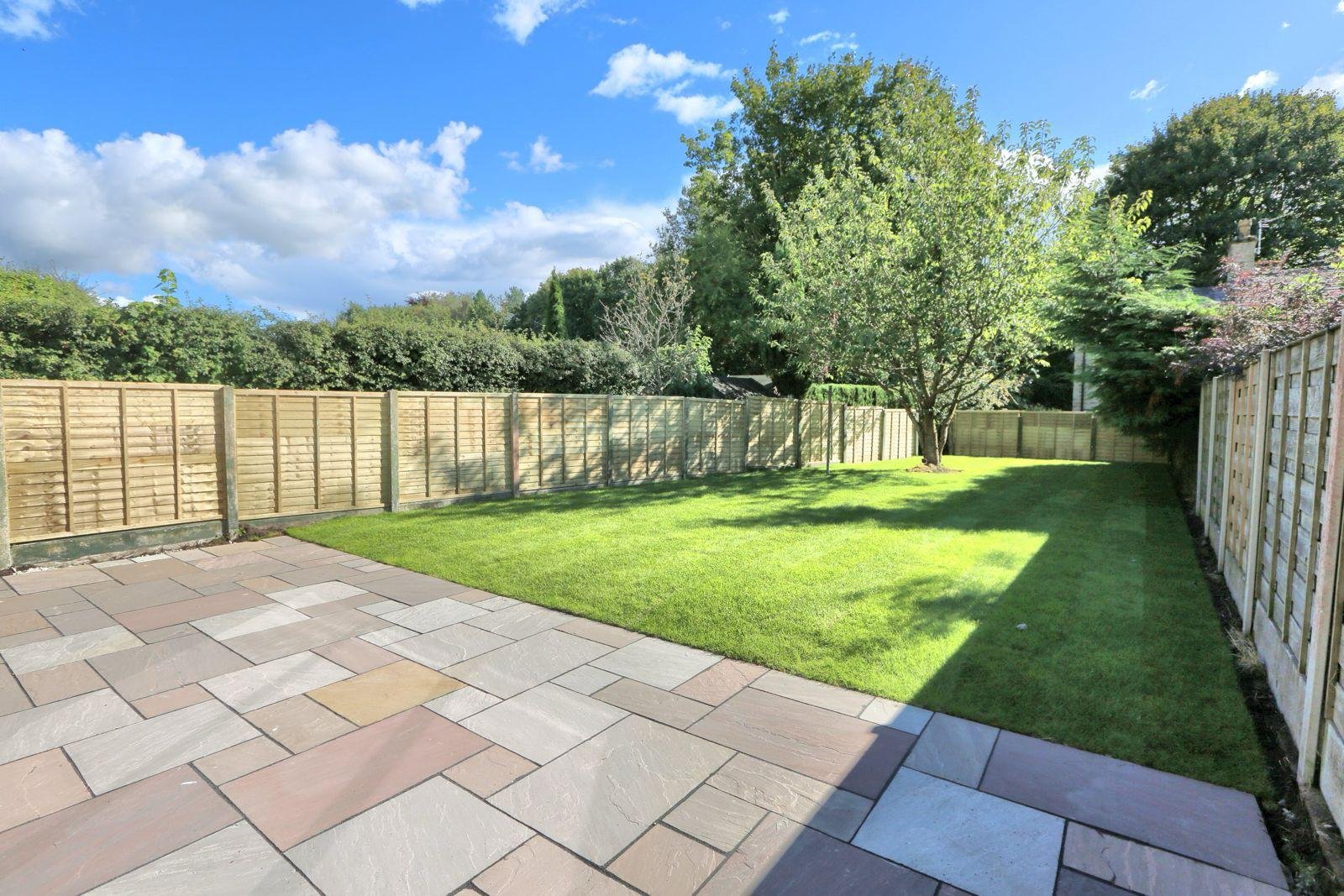Finished garden with new lawn and full-width paved patio
