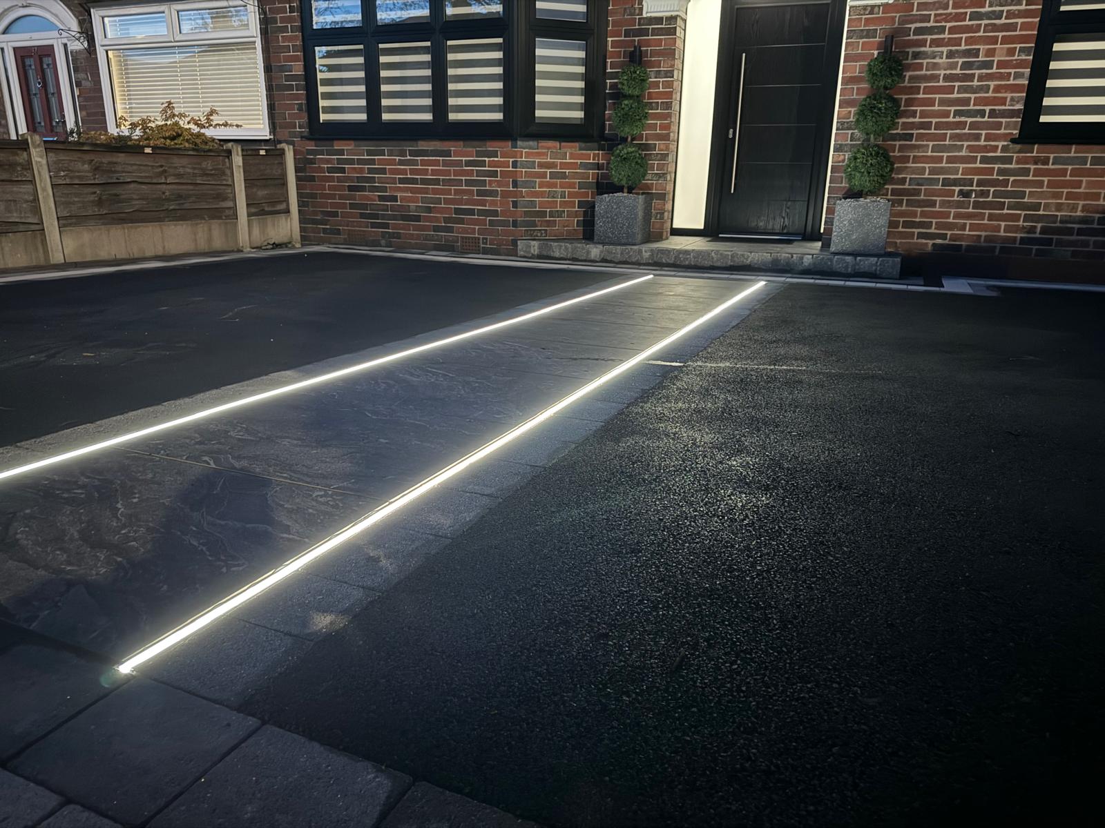 Tarmac driveway with illuminated LED edging installed by Pavedway