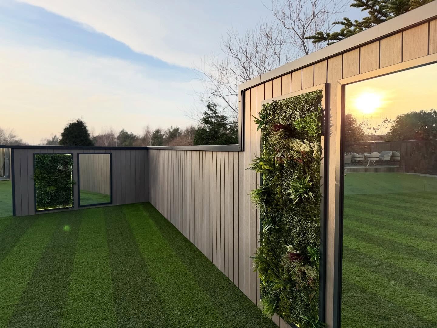 Garden renovation with living wall feature and illuminated corridor, built by Pavedway